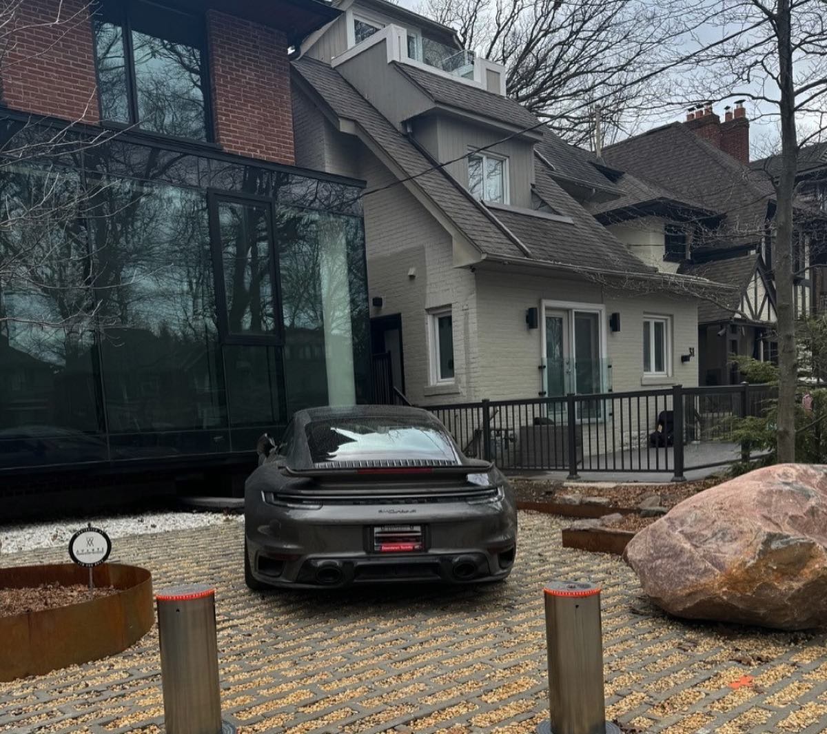 Automatic bollards on a residential paver driveway